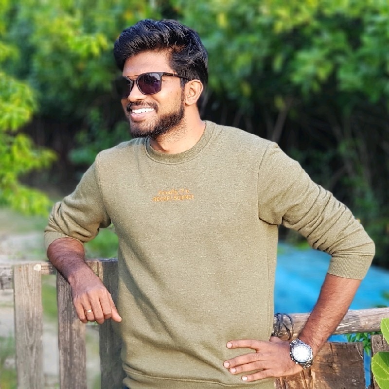 Dr. Vignesh K